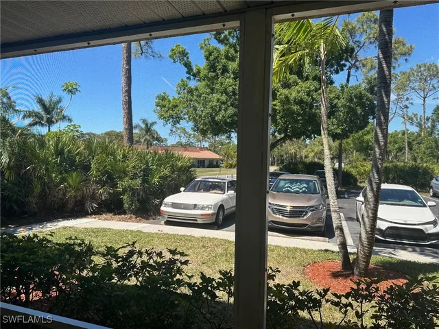 a view of swimming pool from a balcony