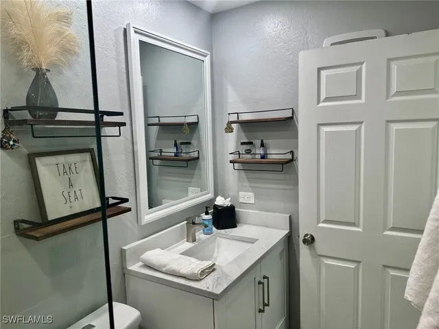 a view of a street with cars