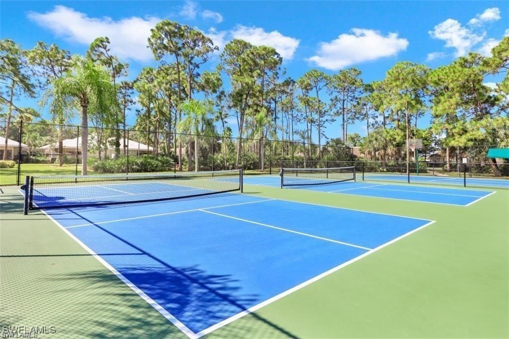3100 Seasons Way, Unit 108 Estero, FL 33928 - Photo 34 of 40 a view of a tennis court