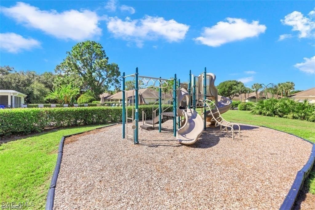 3100 Seasons Way, Unit 108 Estero, FL 33928 - Photo 36 of 40 a view of a park with slide