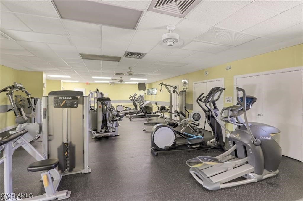 3100 Seasons Way, Unit 108 Estero, FL 33928 - Photo 39 of 40 a view of a room with gym equipment