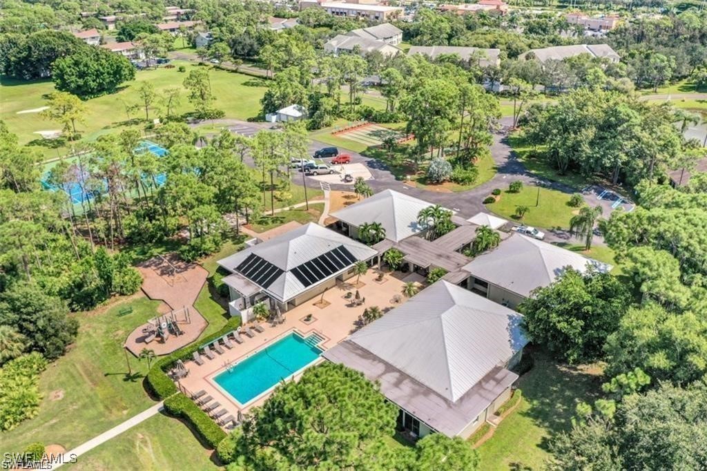 3100 Seasons Way, Unit 108 Estero, FL 33928 - Photo 40 of 40 an aerial view of residential house with outdoor space and swimming pool