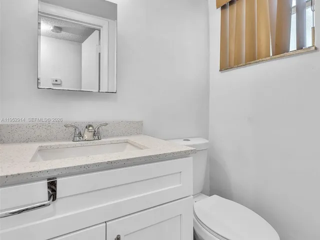 a view of swimming pool with outdoor seating