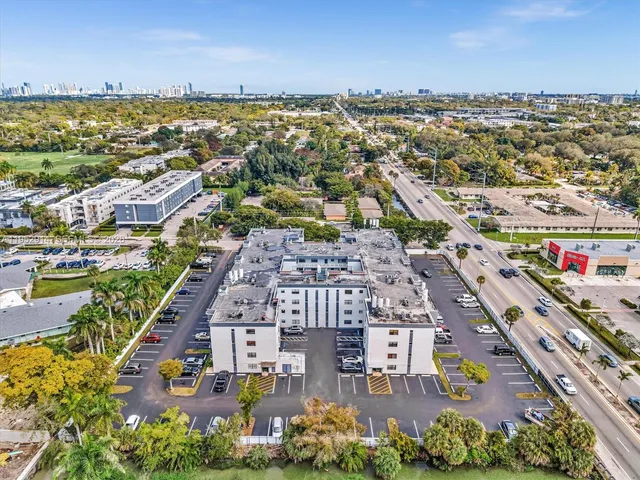 a view of a city with a lake
