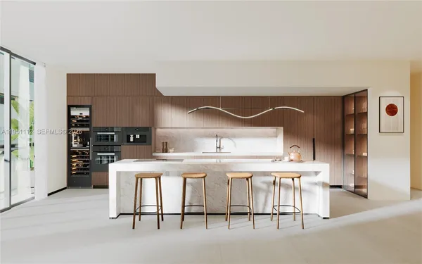 a kitchen with cabinets and chairs