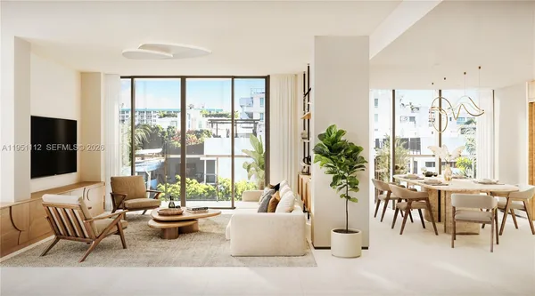 a living room with furniture and large windows
