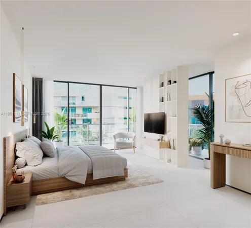 a bedroom with a bed couch and large window