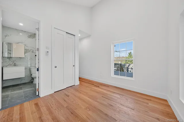 a view of an empty room and window