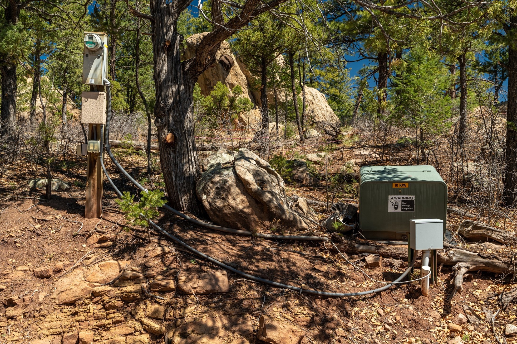 30 Monte La Cueva Road Glorieta, NM 87535 - Photo 7 of 91 Electric meter and transformer