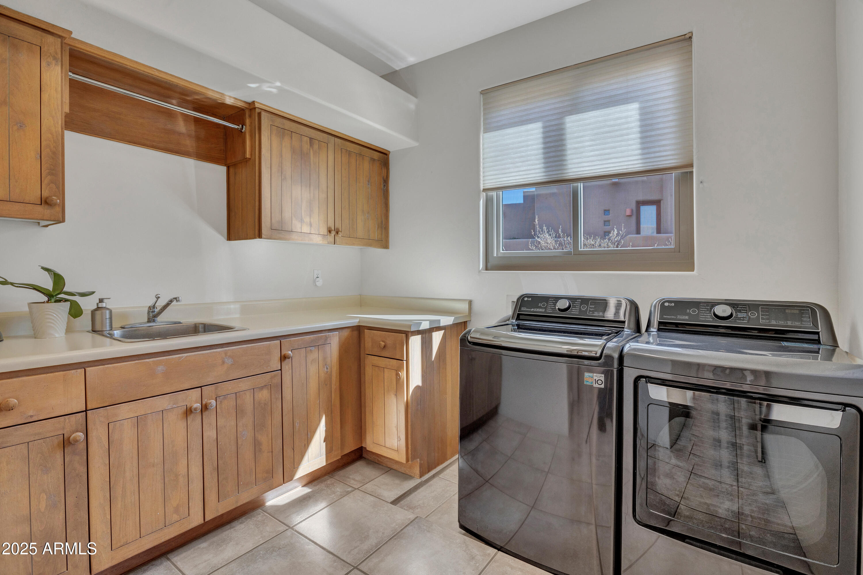 10040 East Happy Valley Road, Unit 249 Scottsdale, AZ 85255 - Photo 24 of 30 Large laundry room