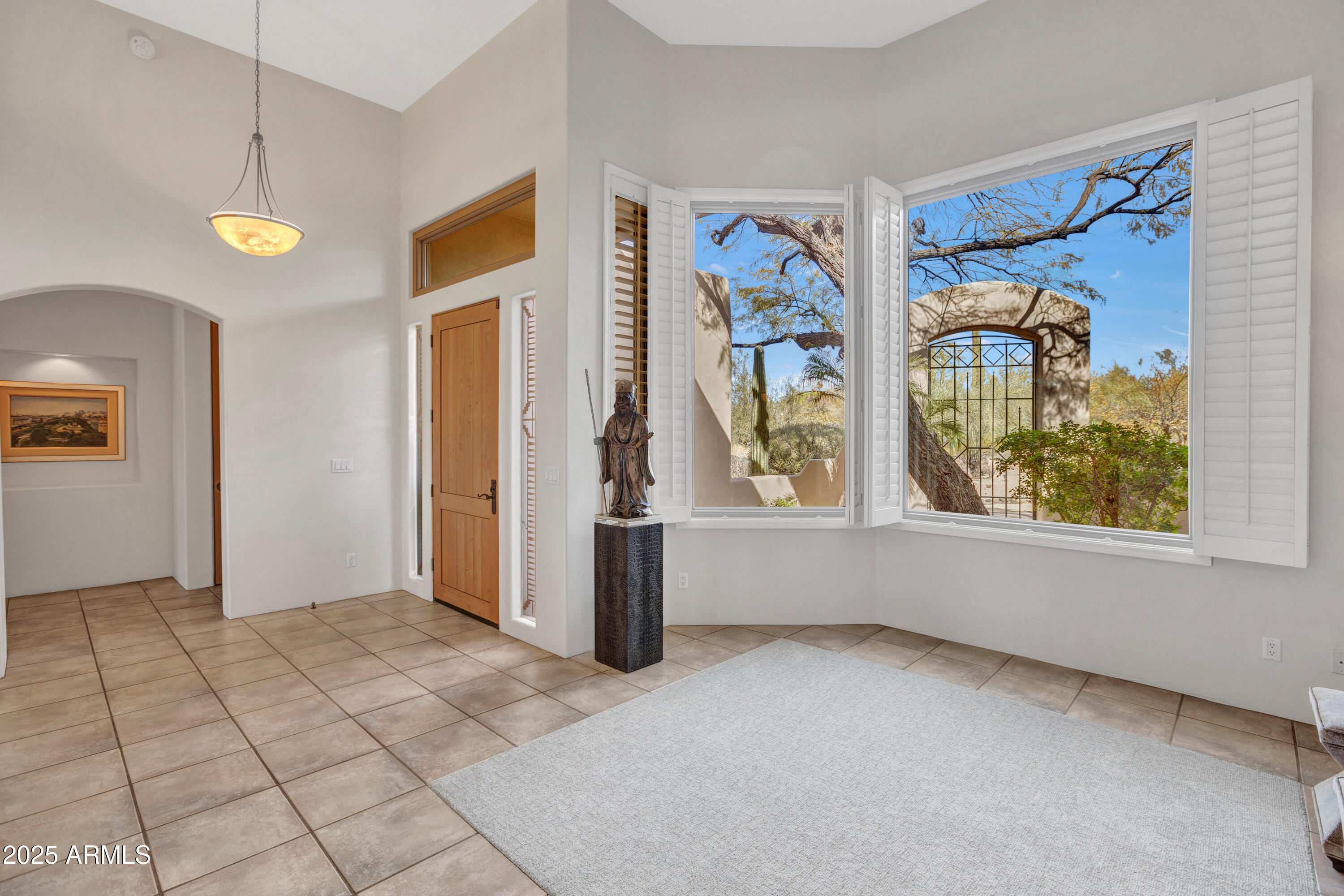 10040 East Happy Valley Road, Unit 249 Scottsdale, AZ 85255 - Photo 7 of 30 Formal dining overlooking the front cour
