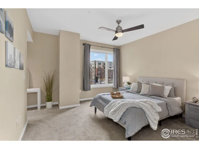 a bathroom with a sink and mirror with toilet