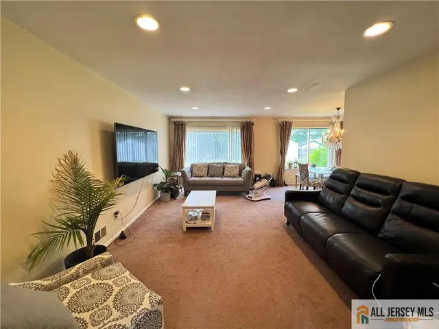 a living room with furniture and a couch