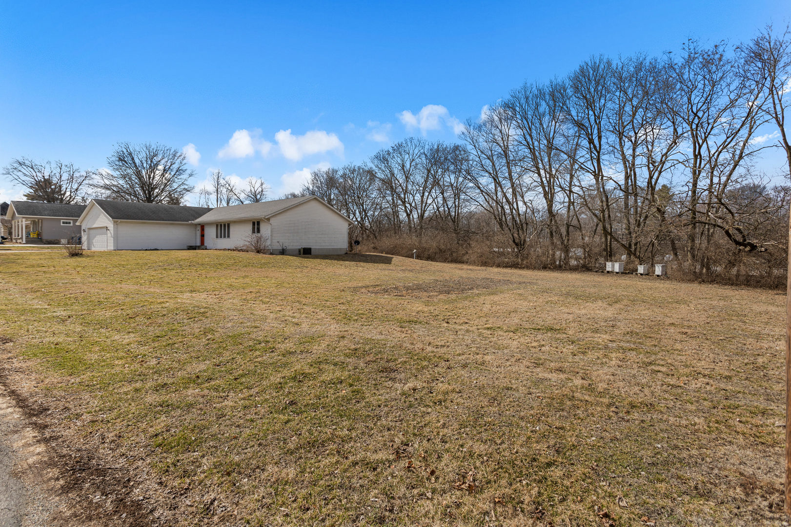 614 South Irving Street Monticello, IL 61856 - Photo 2 of 36 a view of an outdoor space and yard