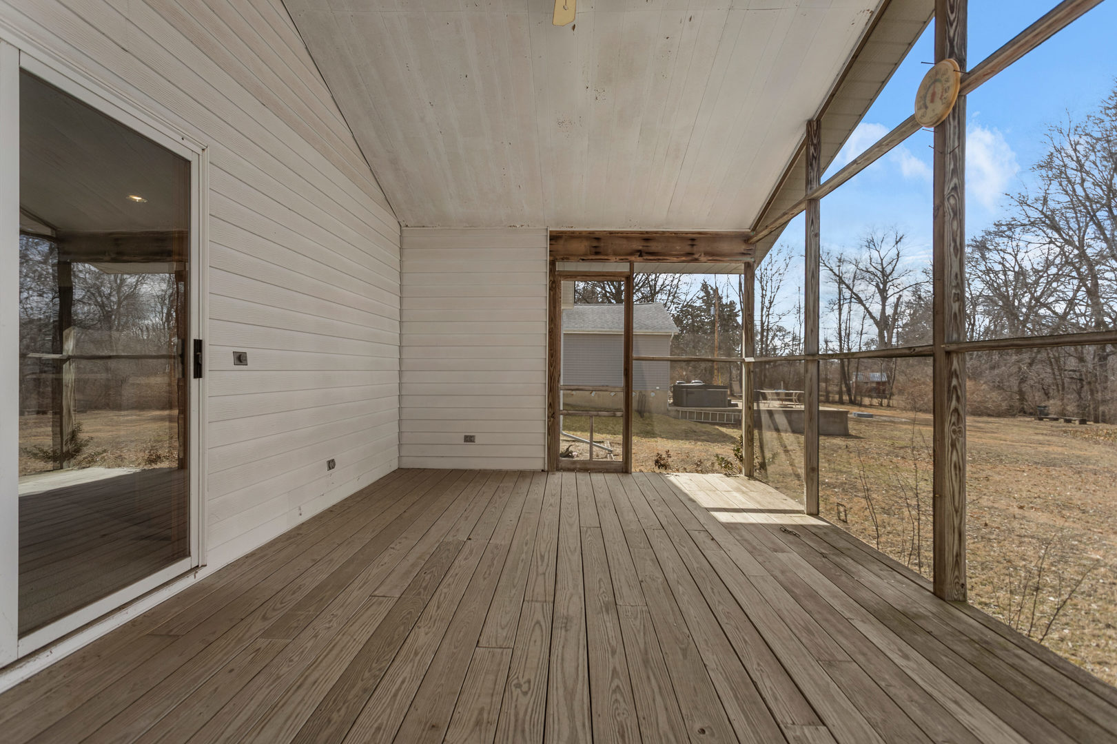 614 South Irving Street Monticello, IL 61856 - Photo 30 of 36 a view of empty room with wooden floor and fan