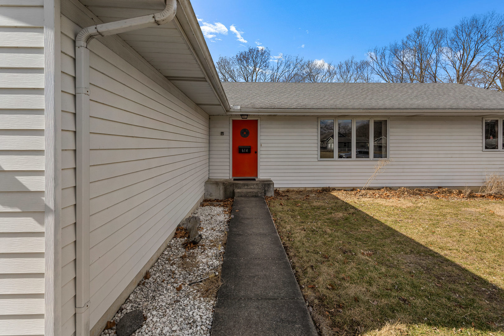 614 South Irving Street Monticello, IL 61856 - Photo 3 of 36 a view of a house with a backyard