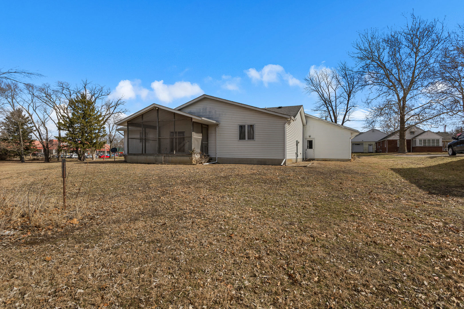 614 South Irving Street Monticello, IL 61856 - Photo 33 of 36 a view of a house with a yard
