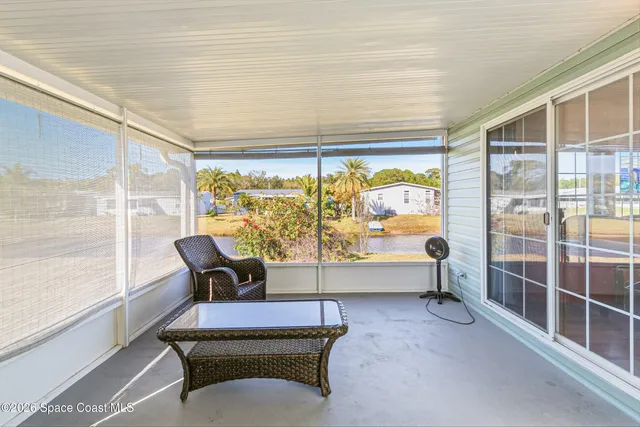 a large kitchen with stainless steel appliances lots of counter space and wooden floor