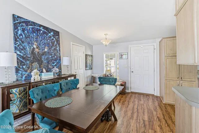 a living room with furniture fireplace and a window