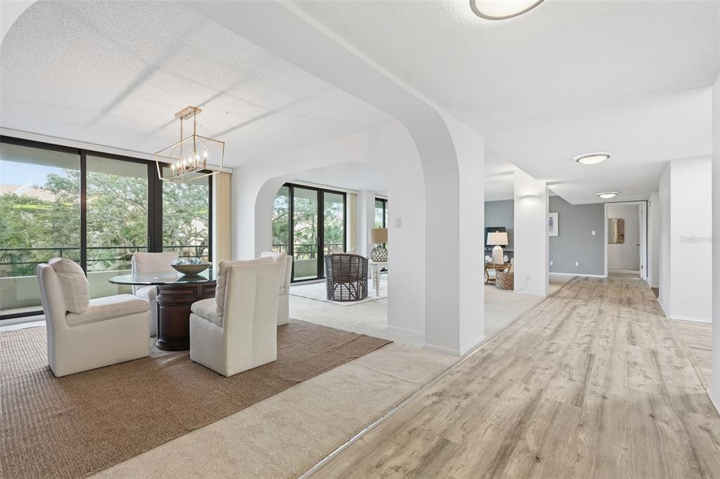 6415 Midnight Pass Road, Unit 211 Sarasota, FL 34242 - Photo 22 of 58 a view of a living room and window