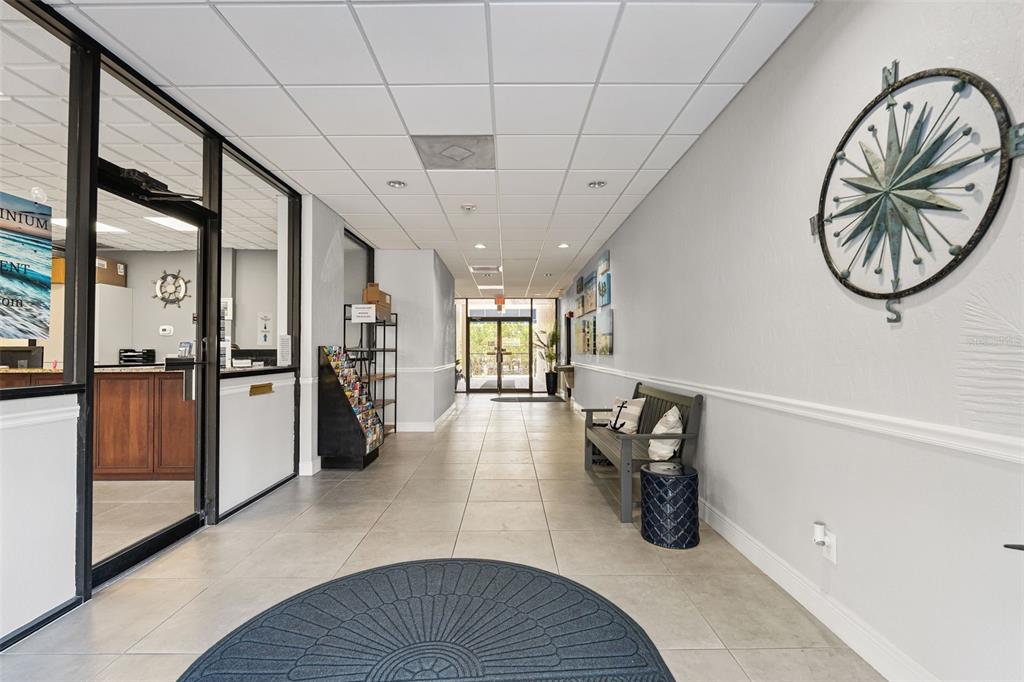 6415 Midnight Pass Road, Unit 211 Sarasota, FL 34242 - Photo 36 of 58 a view of livingroom with furniture and floor to ceiling window