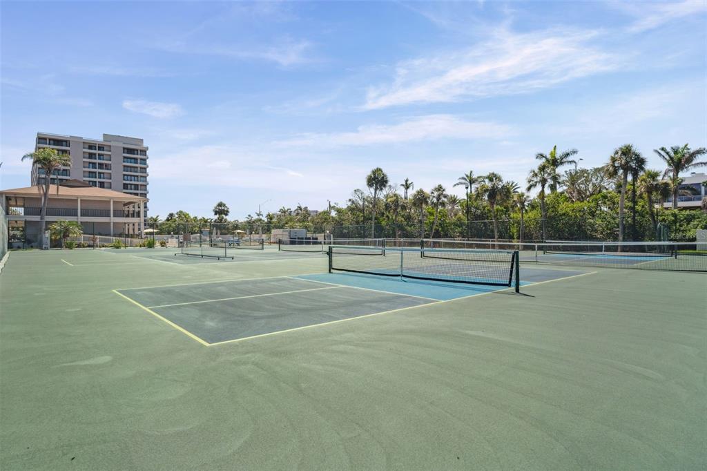 6415 Midnight Pass Road, Unit 211 Sarasota, FL 34242 - Photo 45 of 58 a view of a tennis court