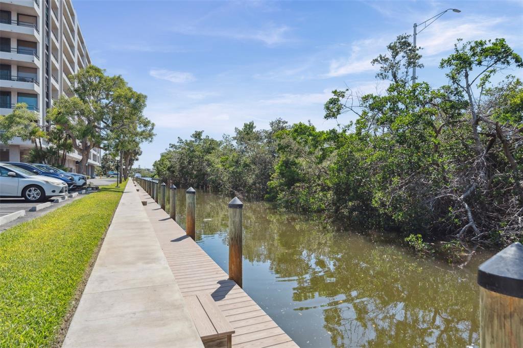 6415 Midnight Pass Road, Unit 211 Sarasota, FL 34242 - Photo 47 of 58 a view of a lake with a floor