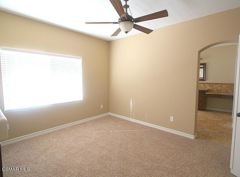 276 Chantilly Circle Simi Valley, CA 93065 - Photo 16 of 25 an empty room with a window and a fan
