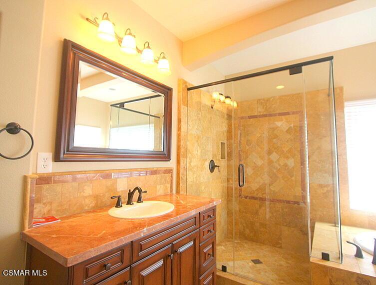 276 Chantilly Circle Simi Valley, CA 93065 - Photo 17 of 25 a bathroom with a sink and a mirror