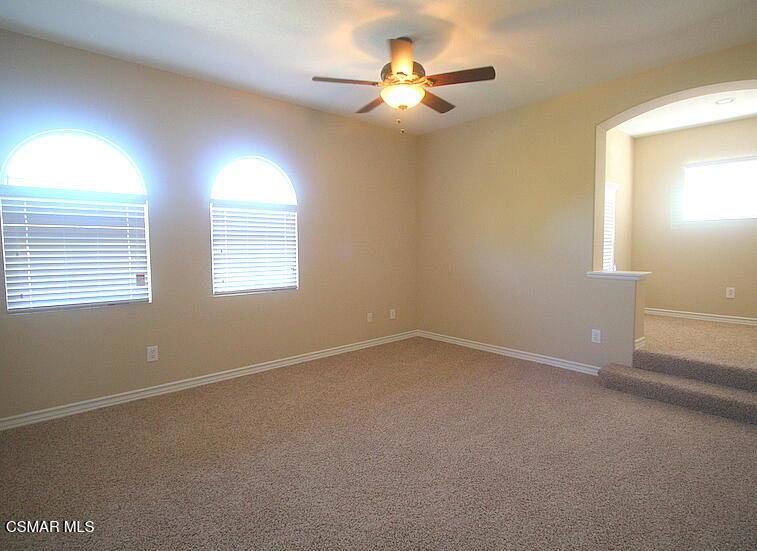 276 Chantilly Circle Simi Valley, CA 93065 - Photo 21 of 25 an empty room with windows and fan