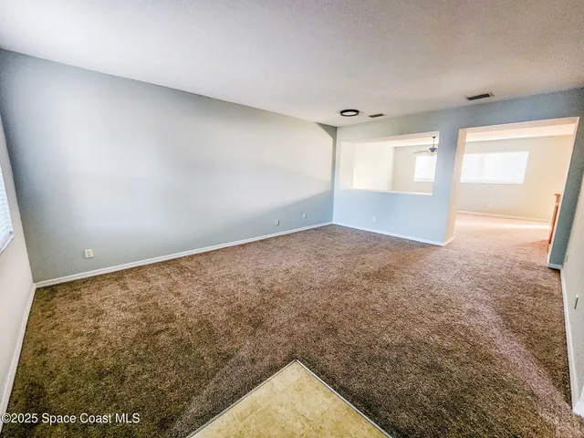 an empty room with a natural light