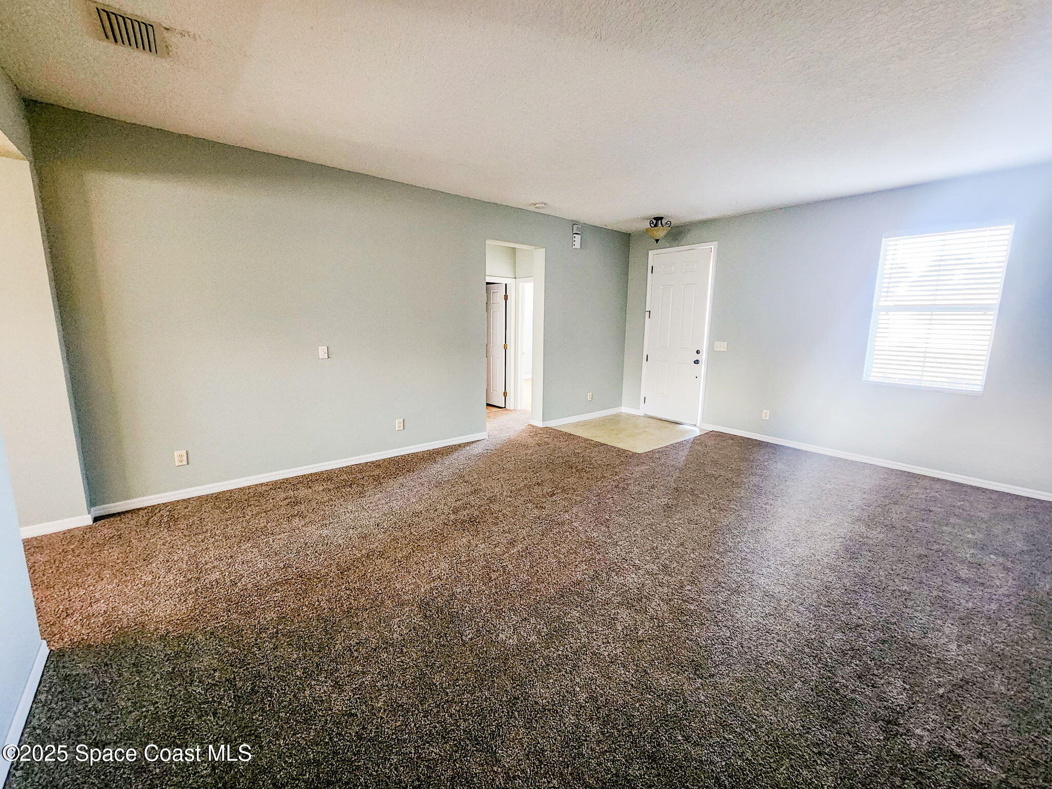 1421 Halstead Avenue Northwest Palm Bay, FL 32907 - Photo 7 of 22 a view of room and window