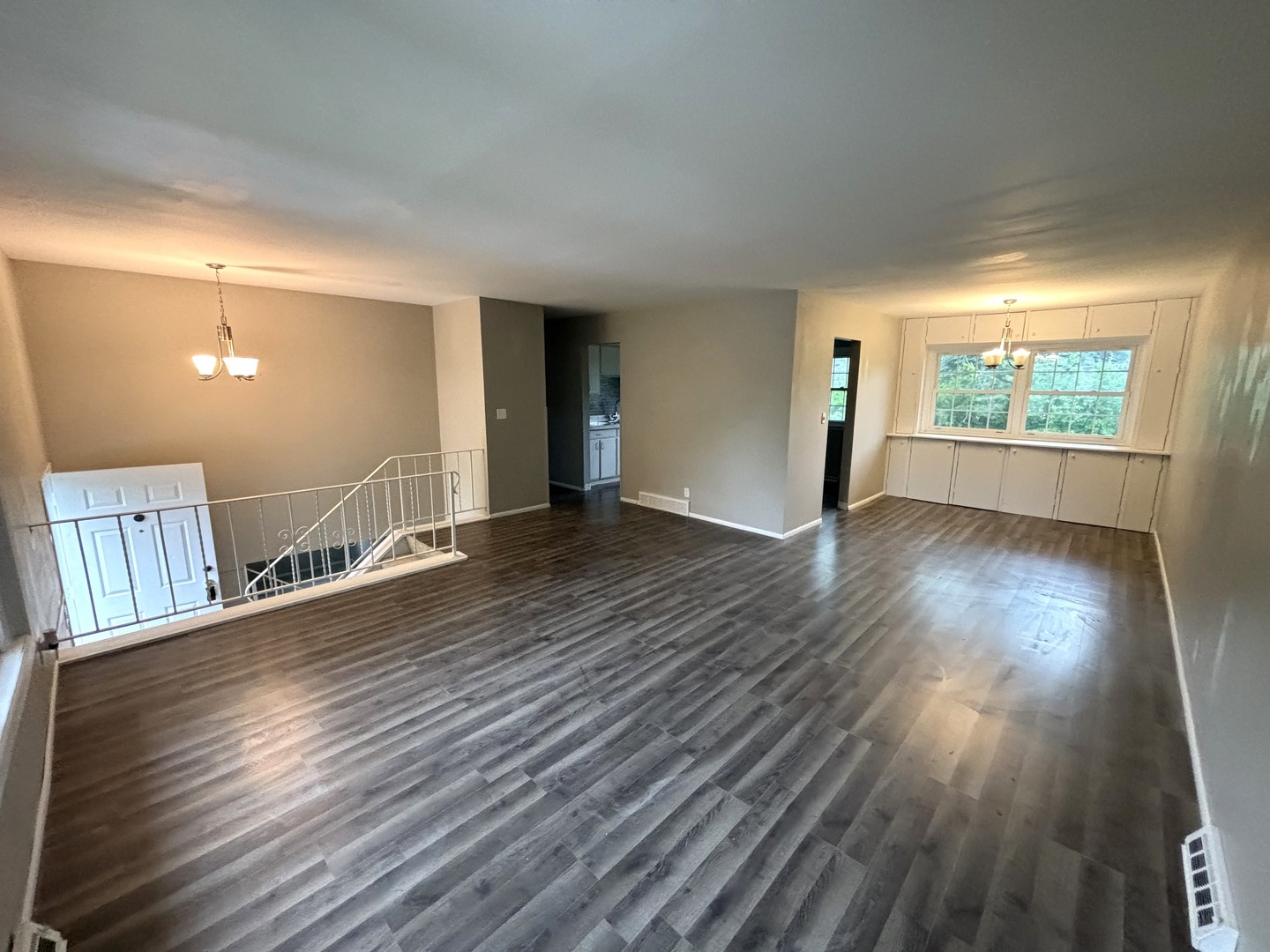 50 Marnel Road Montgomery, IL 60538 - Photo 2 of 12 a view of a room with wooden floor and window