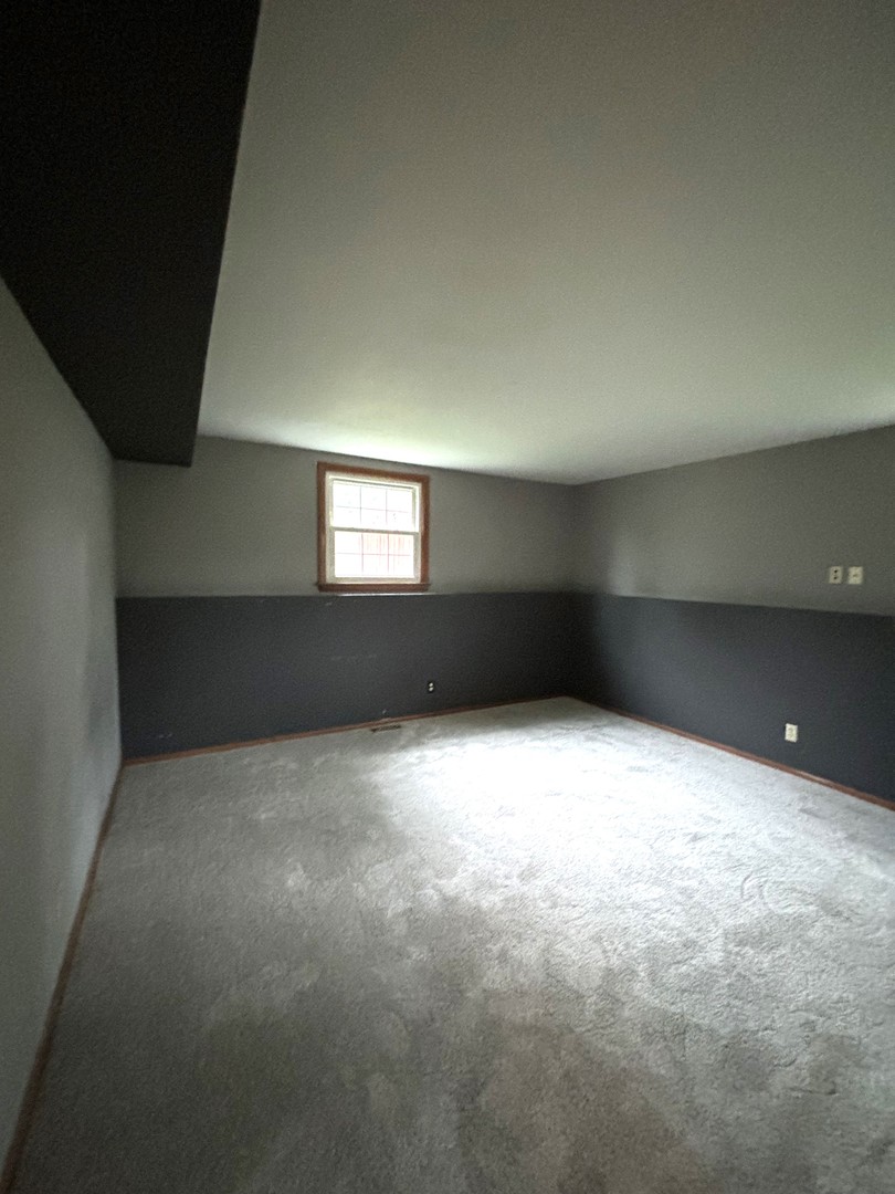 50 Marnel Road Montgomery, IL 60538 - Photo 10 of 12 a view of an empty room and window
