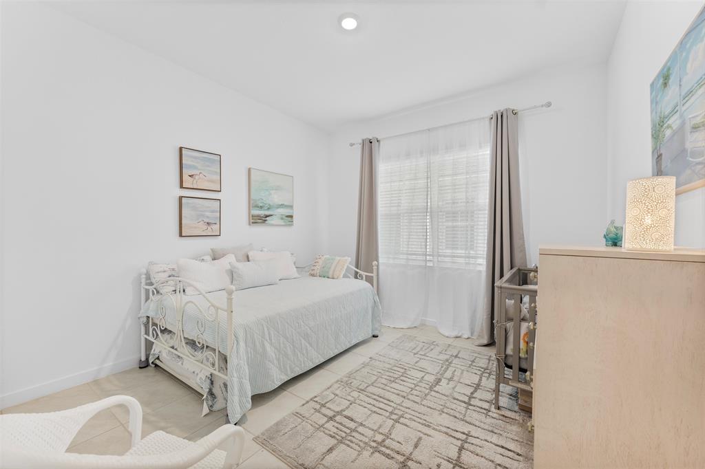 19707 Weathervane Way Loxahatchee, FL 33470 - Photo 11 of 51 a bedroom with a bed and a cabinets