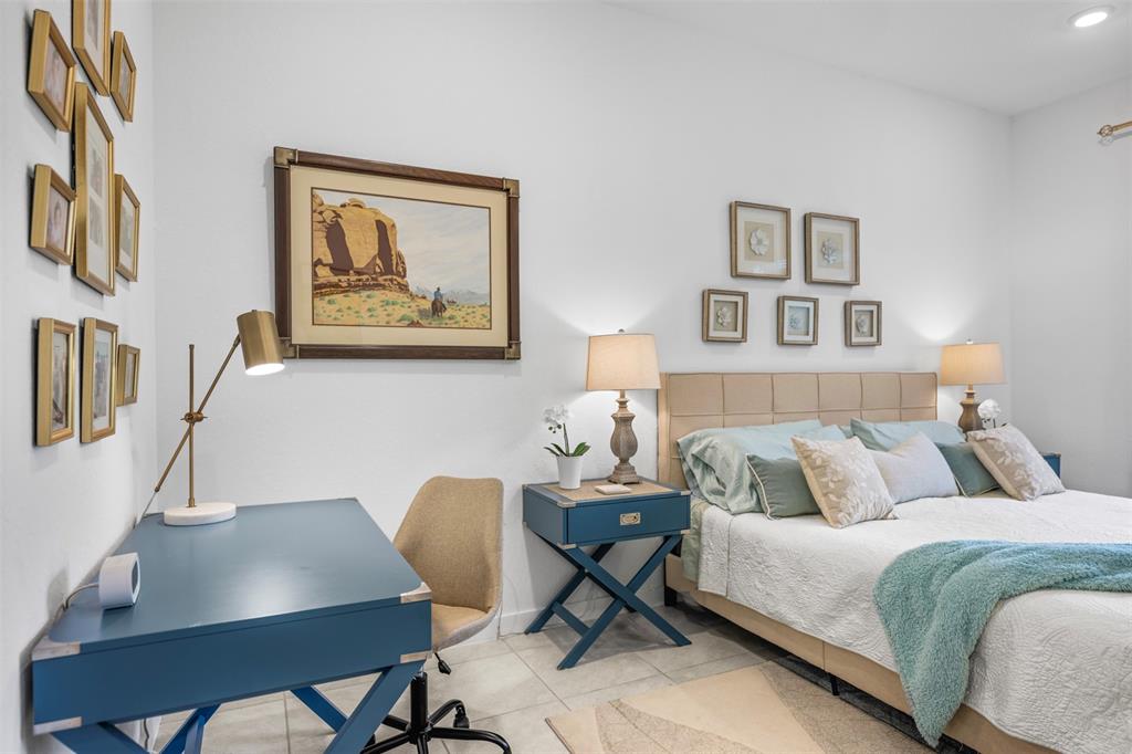 19707 Weathervane Way Loxahatchee, FL 33470 - Photo 17 of 51 a bedroom with a bed and a table chair