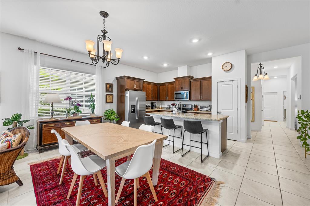 19707 Weathervane Way Loxahatchee, FL 33470 - Photo 20 of 51 a view of a dining room with furniture