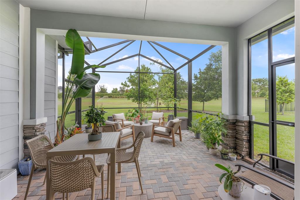 19707 Weathervane Way Loxahatchee, FL 33470 - Photo 28 of 51 a view of a dining room with furniture window and outside view