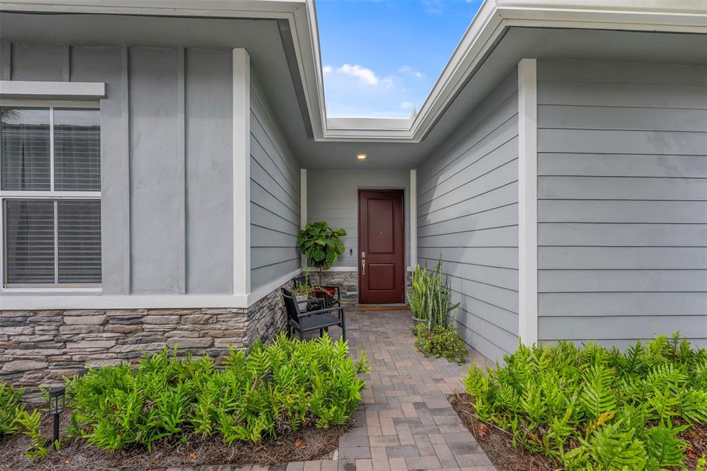 19707 Weathervane Way Loxahatchee, FL 33470 - Photo 31 of 51 a view of house with backyard and garden