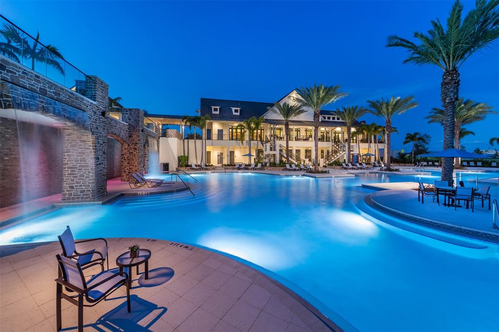 19707 Weathervane Way Loxahatchee, FL 33470 - Photo 35 of 51 a view of a swimming pool with outdoor seating