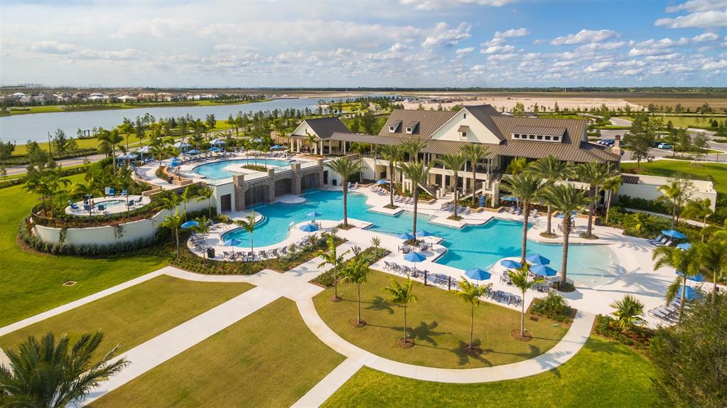 19707 Weathervane Way Loxahatchee, FL 33470 - Photo 41 of 51 a view of a swimming pool with an ocean view