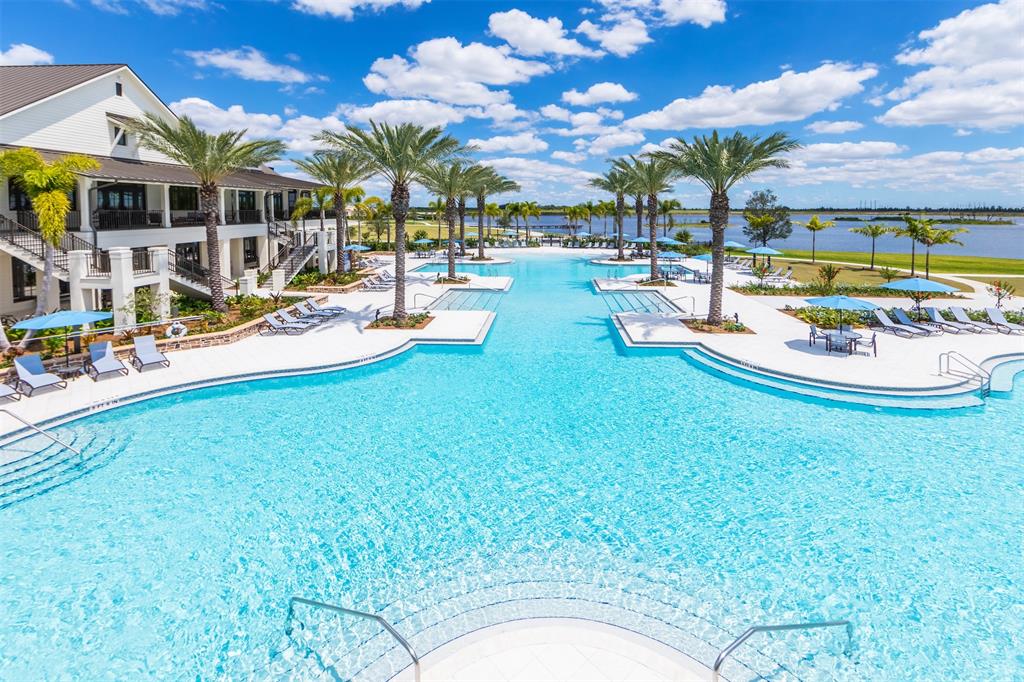 19707 Weathervane Way Loxahatchee, FL 33470 - Photo 48 of 51 a view of a swimming pool with outdoor seating