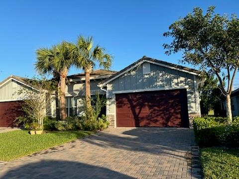 19707 Weathervane Way Loxahatchee, FL 33470 - Photo 50 of 51 a front view of a house with garden