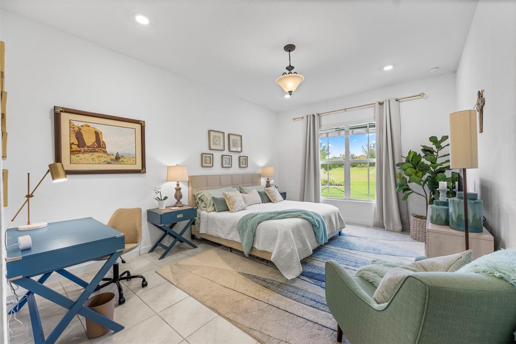 19707 Weathervane Way Loxahatchee, FL 33470 - Photo 6 of 51 a living room with furniture and a potted plant
