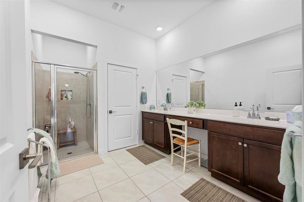19707 Weathervane Way Loxahatchee, FL 33470 - Photo 7 of 51 a spacious bathroom with a double vanity sink mirror and shower