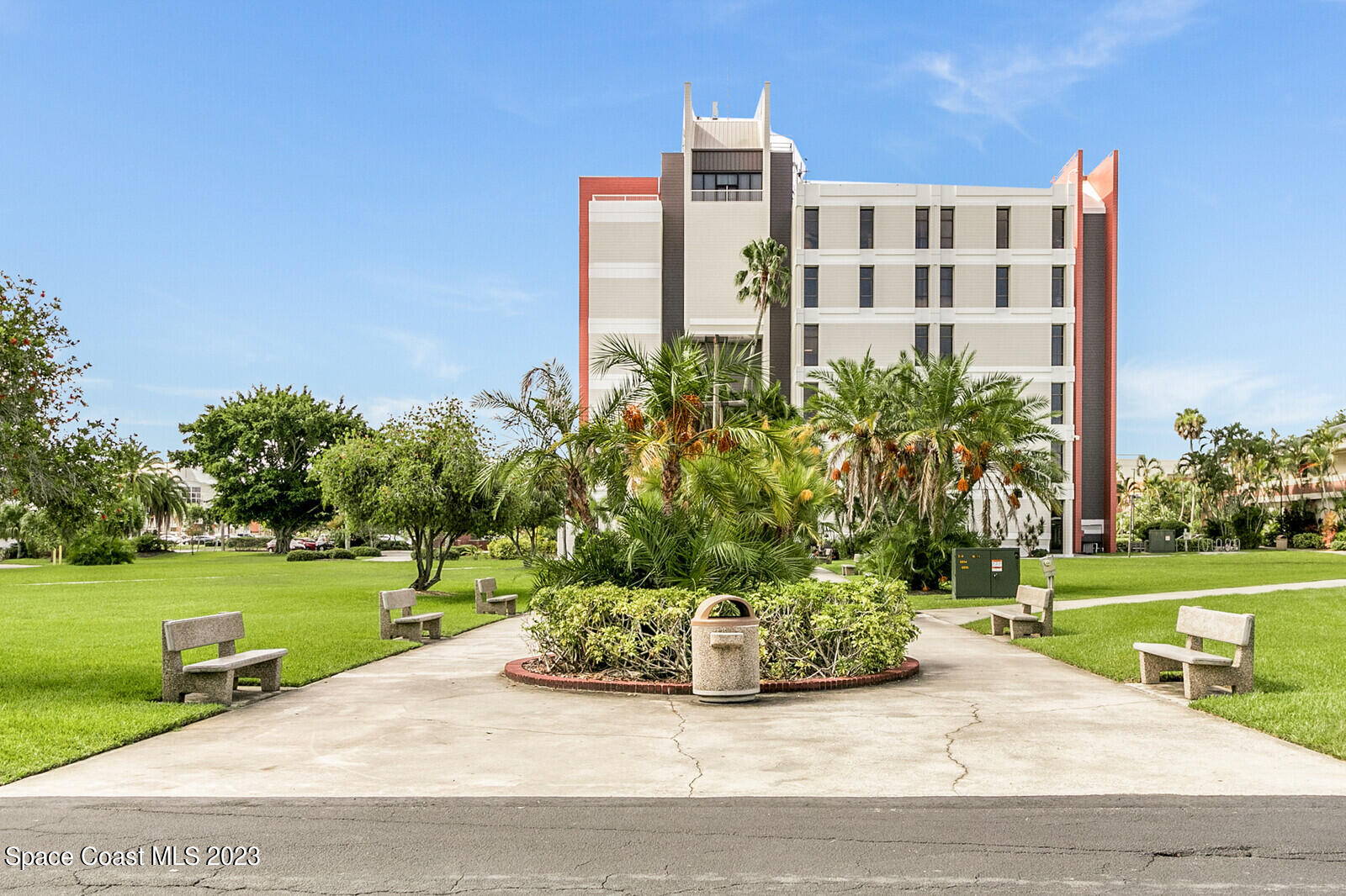 3229 Marshall Drive Melbourne, FL 32901 - Photo 27 of 36 a view of a building with garden and bench