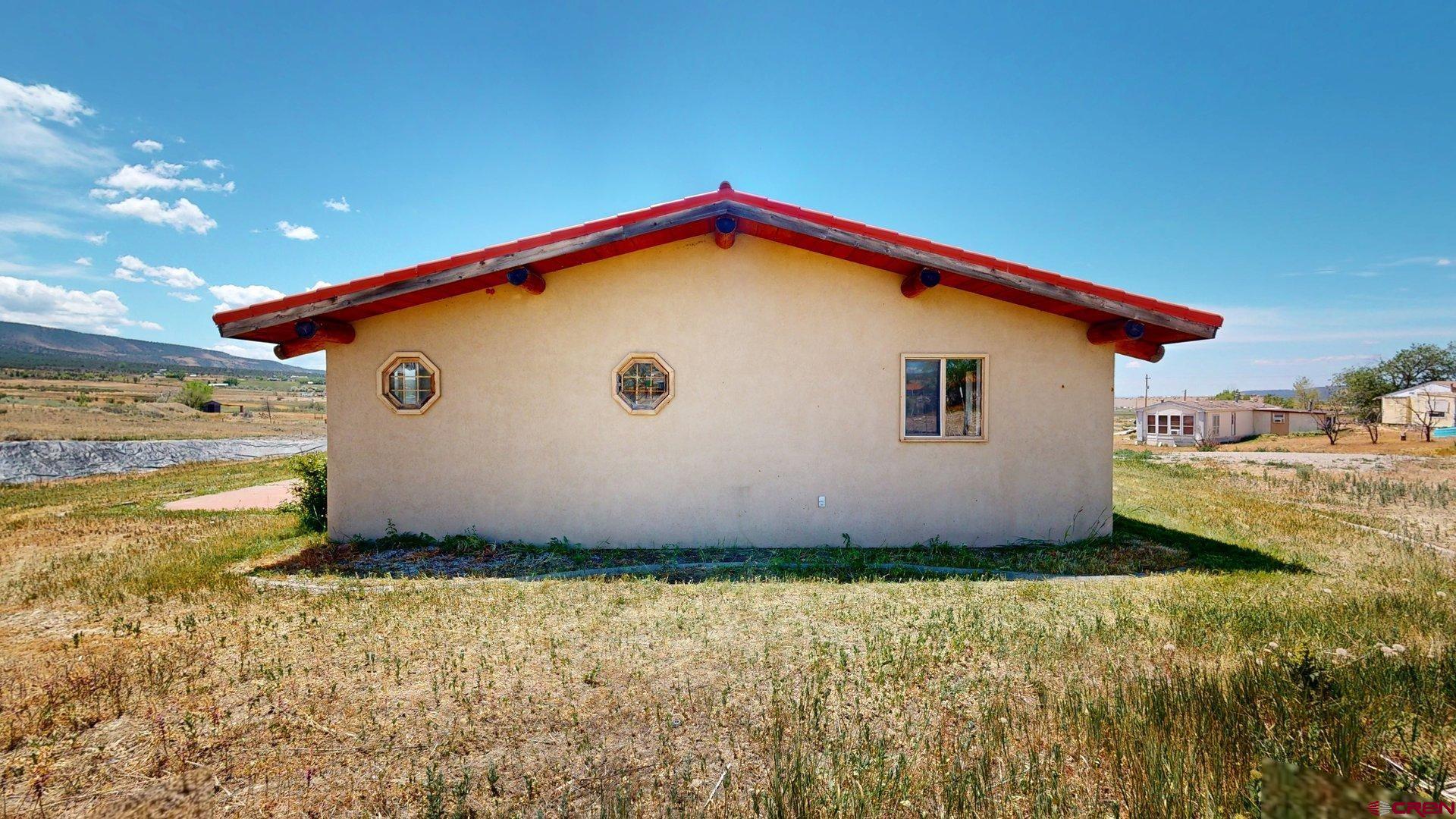 40557 M75 Road Paonia, CO 81428 - Photo 27 of 34 a view of a house with backyard