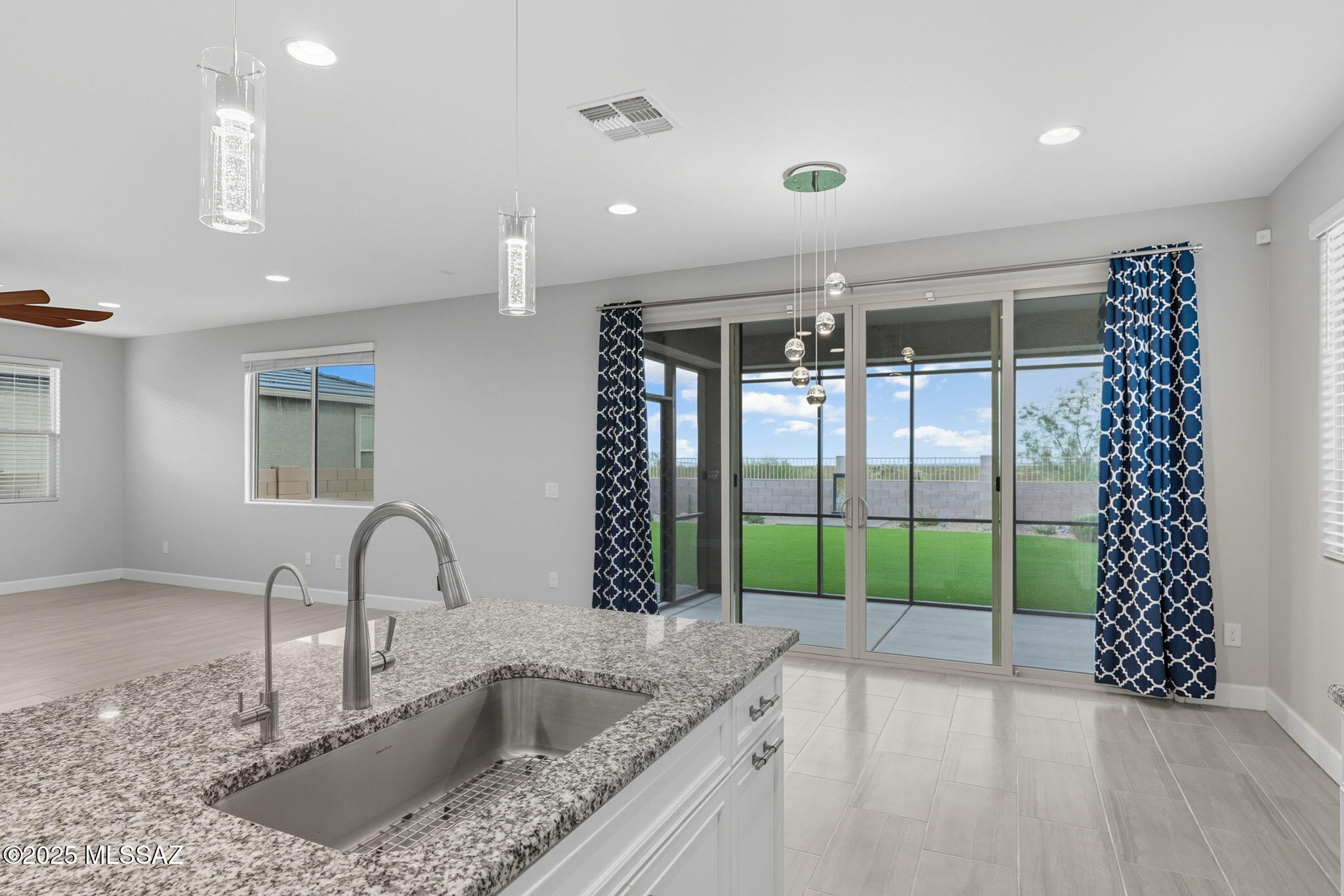 12100 East Ryscott Circle Vail, AZ 85641 - Photo 14 of 53 a kitchen with a sink and a large window
