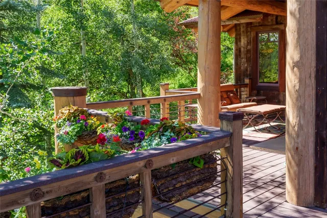 a view of a swimming pool with a yard and mountain view