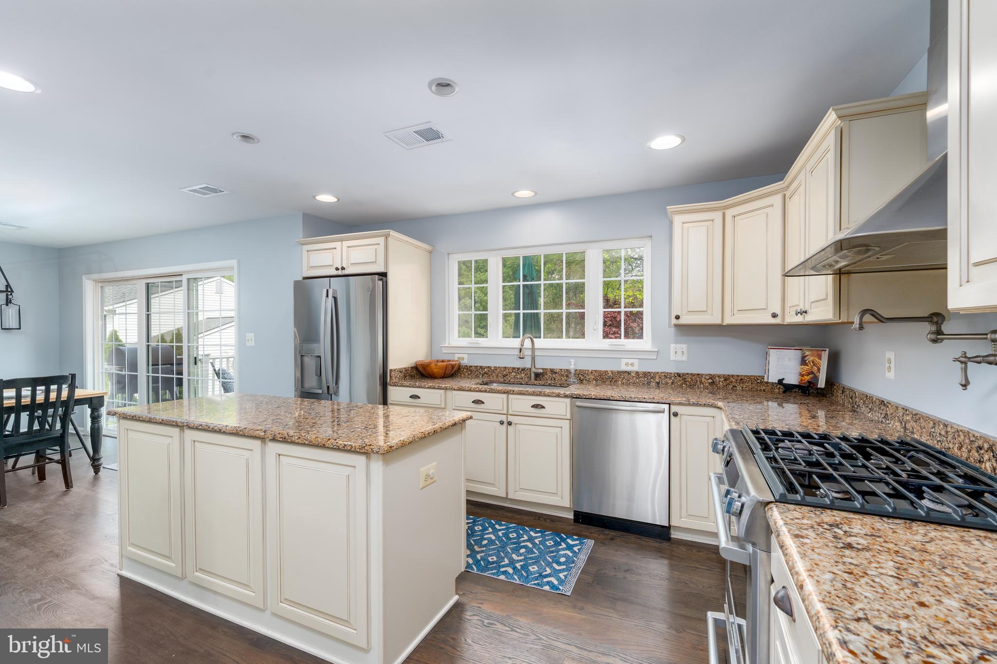 1346 Becket Road Eldersburg, MD 21784 - Photo 15 of 73 a kitchen with granite countertop a sink stove and cabinets